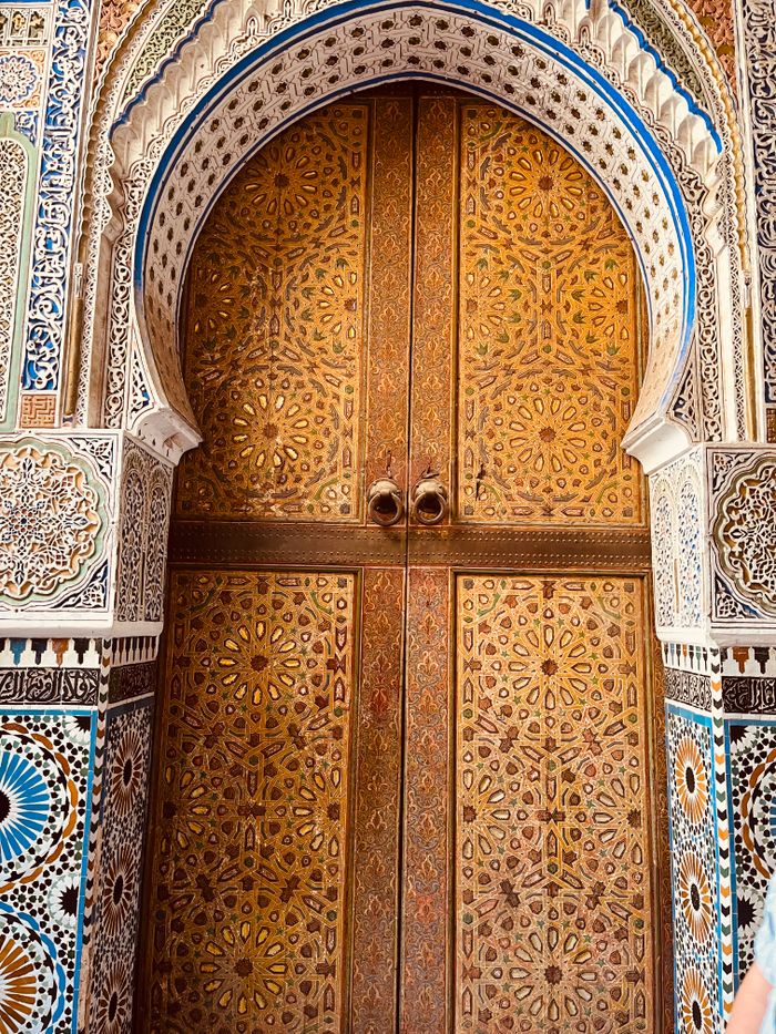 Home Beautifully carved Moroccan door with Islamic geometric designs.