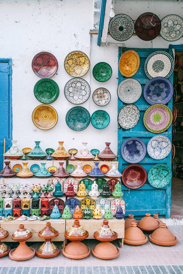 Home Exterior of local shop with various oriental utensils and elements for decor on wall and shelves on city street
